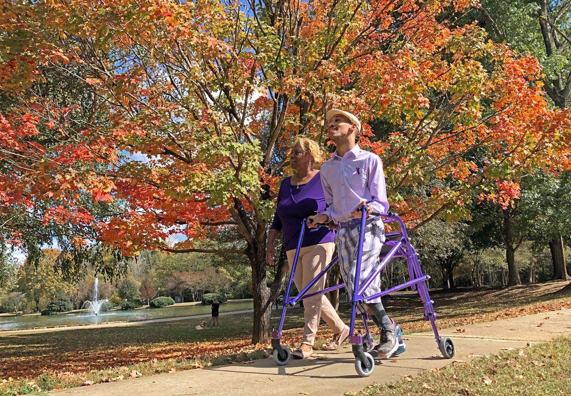 Saundra, left and Chancellor Lee Adams, right, enjoy the warm fall weather and foliage at Freedom Park in Charlotte, NC on Wednesday, October 30, 2024.