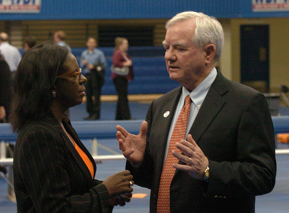 Democratic county commission candidates Wilhelmenia Rembert and Parks Helms talk at the Grady Cole Center Tuesday night in 2004.