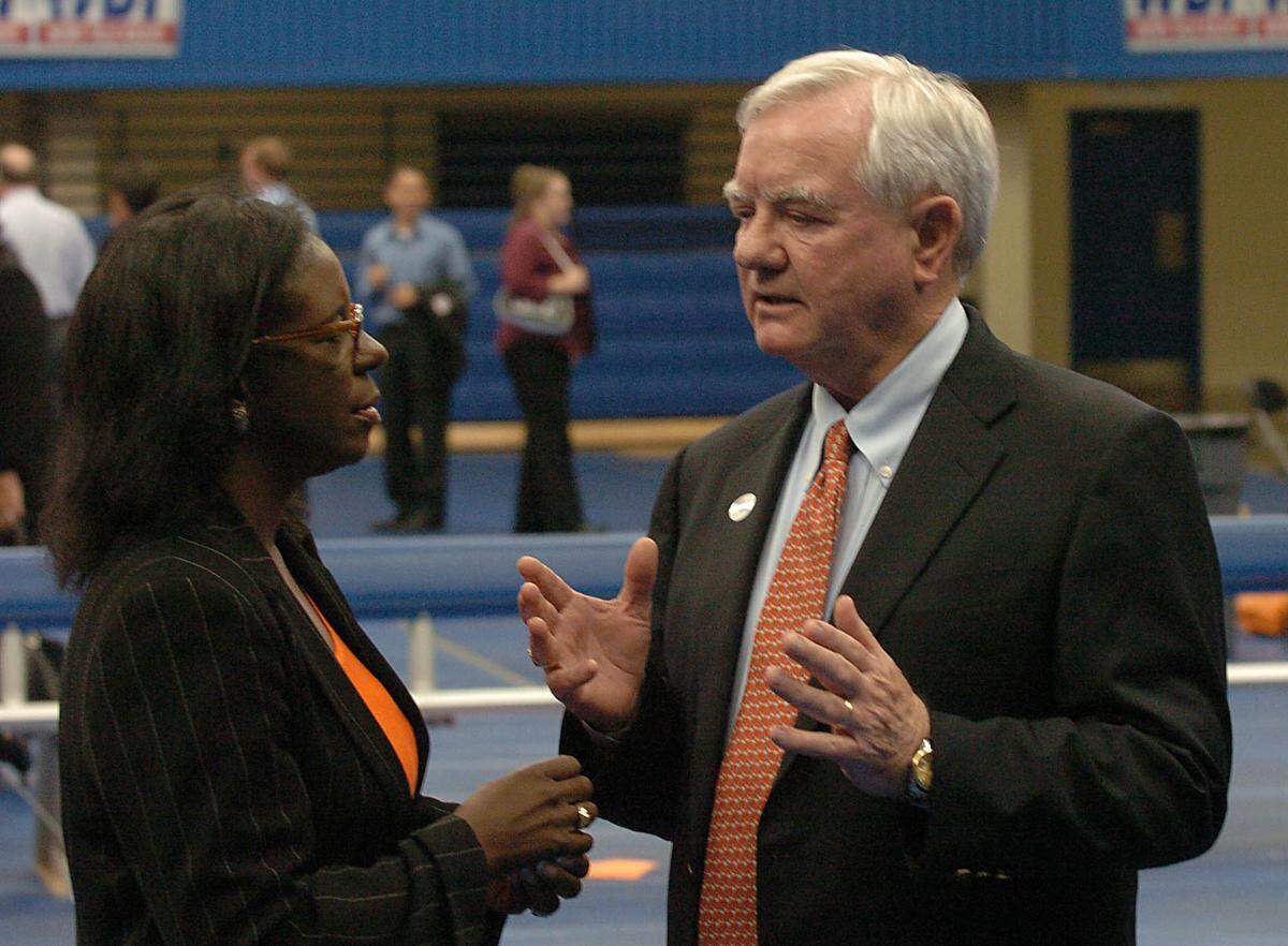 Democratic county commission candidates Wilhelmenia Rembert and Parks Helms talk at the Grady Cole Center Tuesday night in 2004.