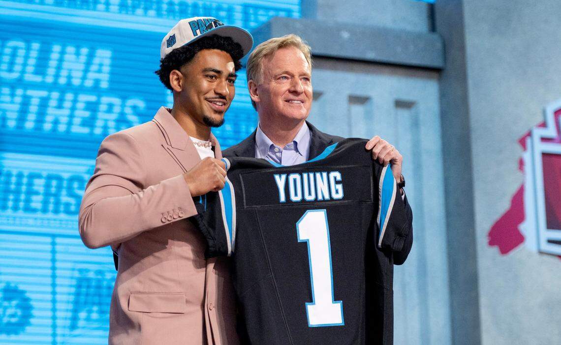 Alabama quarterback Bryce Young poses for photos with NFL Commissioner Roger Goodell after being picked first overall by the Carolina Panthers during the NFL Draft outside of Union Station on Thursday, April 27, 2023, in Kansas City.
