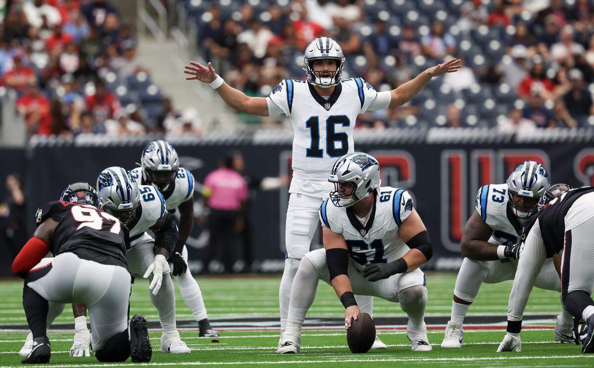 Aug 16, 2025; Houston, Texas, USA; Carolina Panthers quarterback Jack Plummer (16) calls a play against the Houston Texans in the second quarter at NRG Stadium. 
