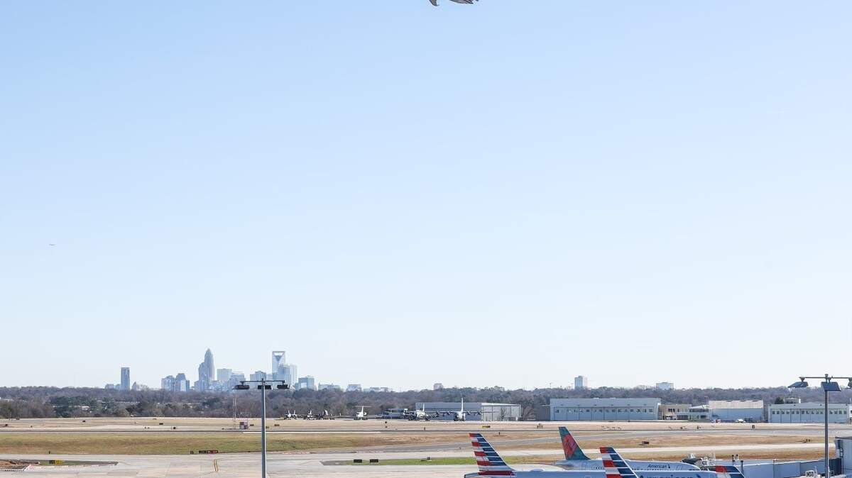 A plane takes off from Charlotte Douglas International Airport during one of the busiest days for holiday travel on Friday, December 23, 2022.