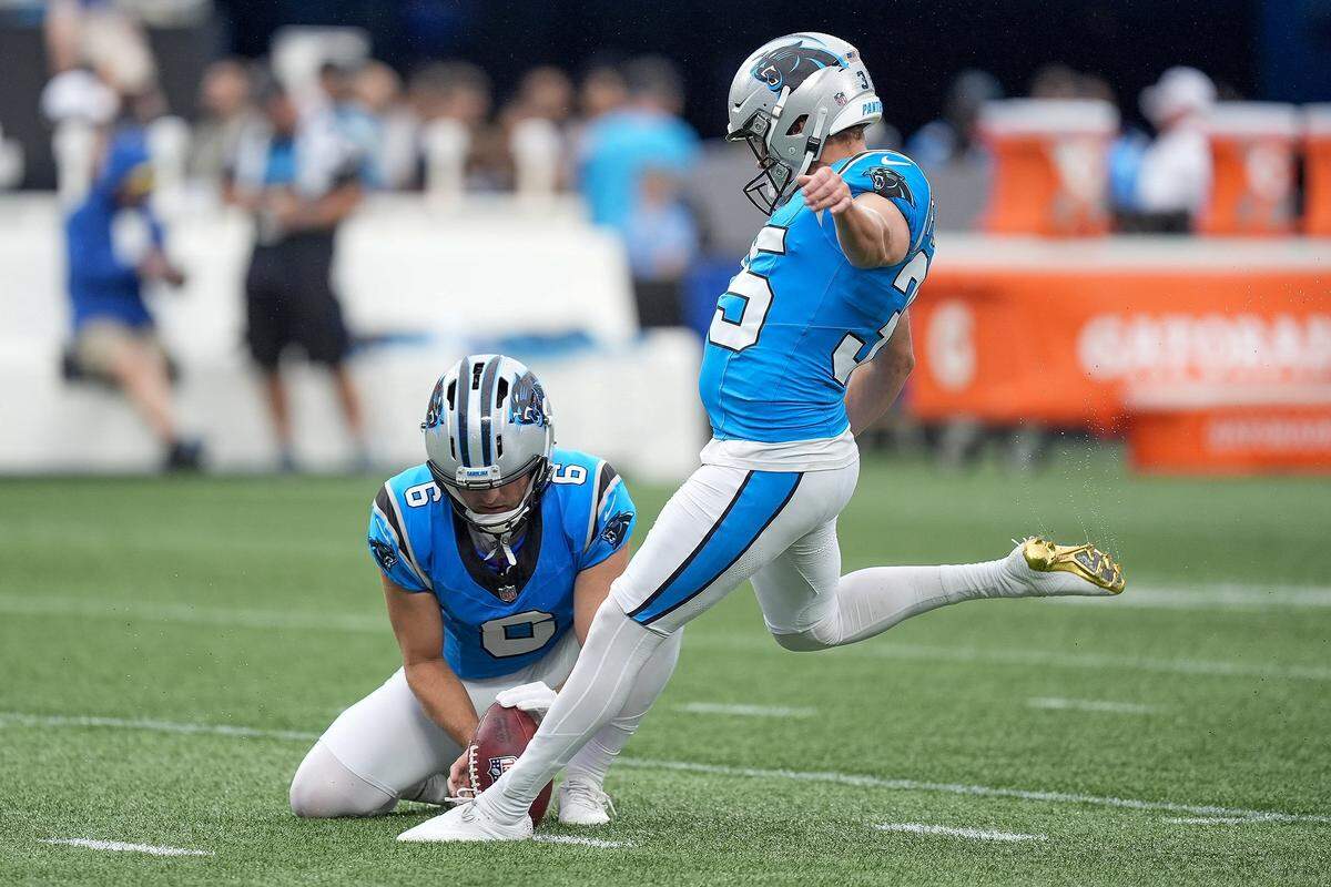 Aug 2, 2025; Charlottle, NC, USA; Carolina Panthers place kicker Ryan Fitzgerald (35) kicks during Fanfest at Bank of America Stadium. Mandatory Credit: Jim Dedmon-Imagn Images