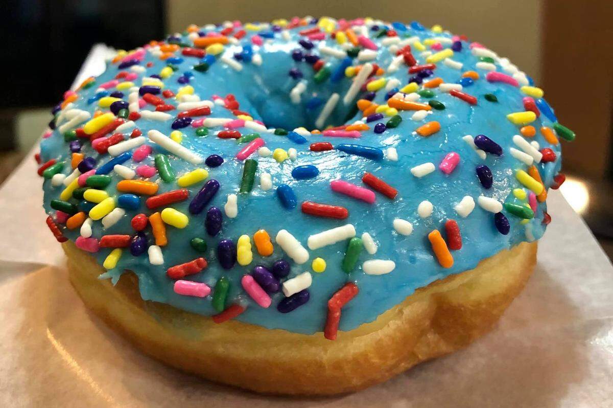 Get an extra large doughnut from the new OMG Donuts & Coffee location in MoRA.