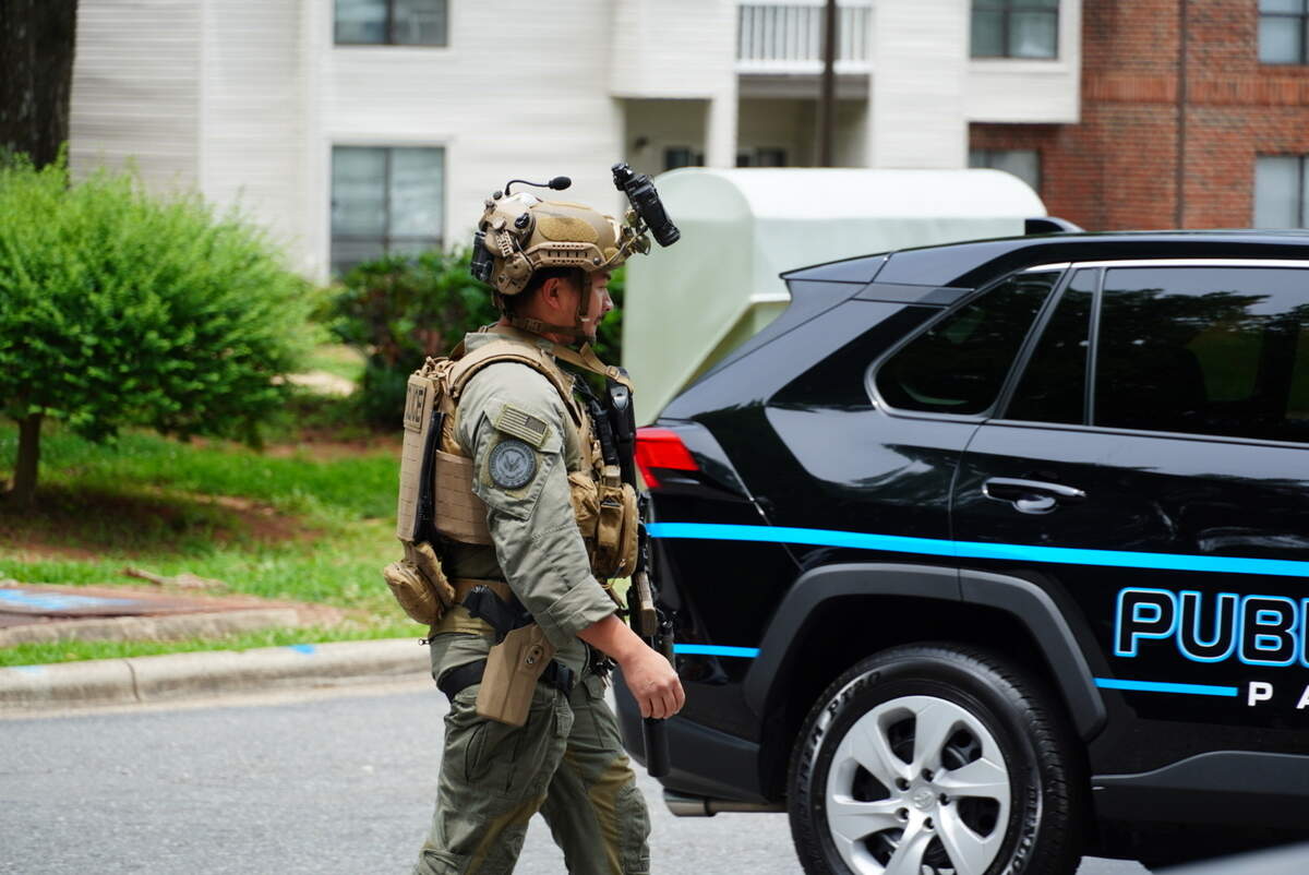CMPD SWAT officers were seen with rifles and specialized transport equipment in an attempt to catch an individual.