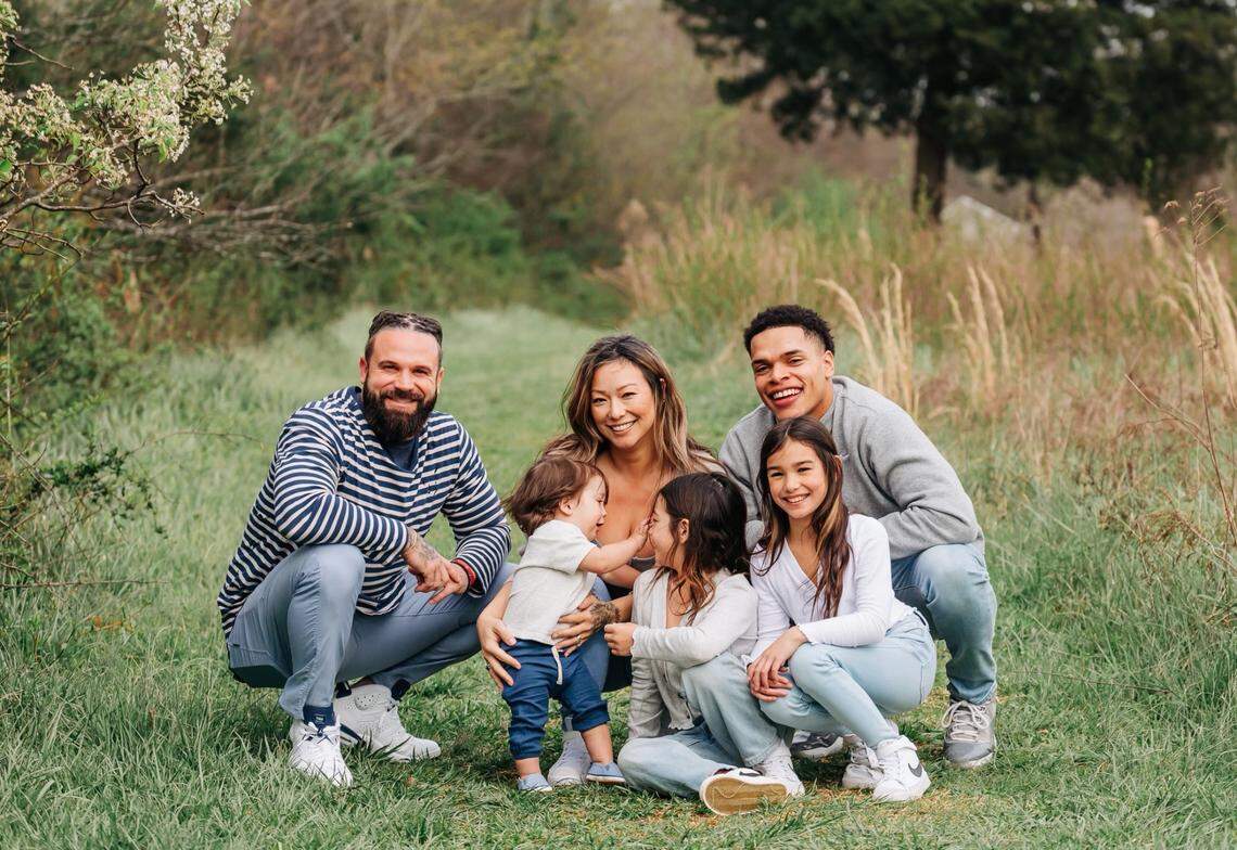 The Greiner family, from left: coach Greiner, Elijah Rock, 21 months; wife Connie; Journi FAItH, 9; Charli Belles, 10; and Braheim Murphy, 24