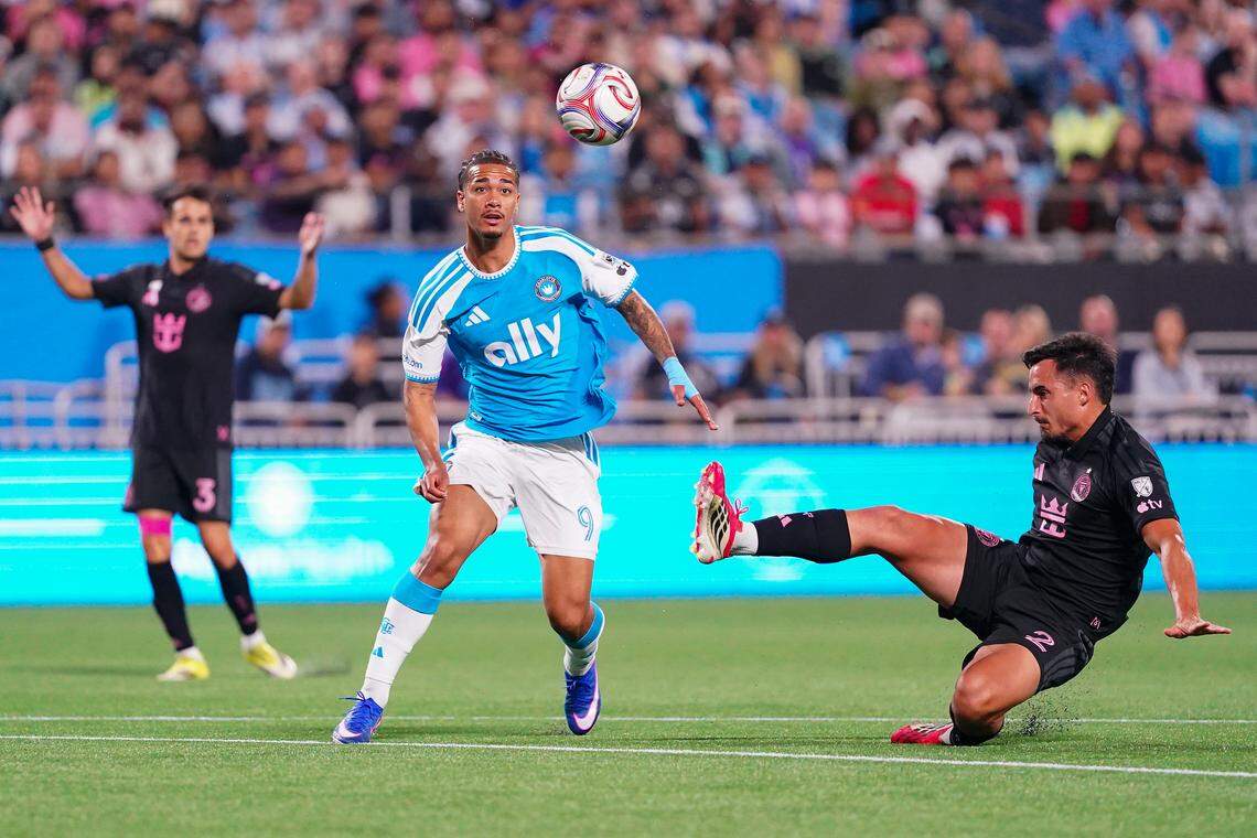 Idan Toklomati (9) of Charlotte FC and Gonzalo Luján (2) of Inter Miami CF compete for the ball during Saturday’s match at Bank of America Stadium in Charlotte.