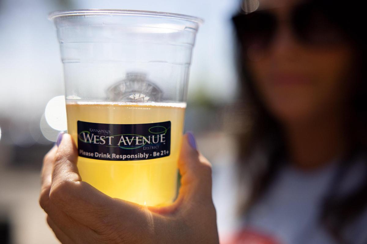 Bars and restaurants must provide social district labeled cups under state law, like the one seen here in the Kannapolis district.