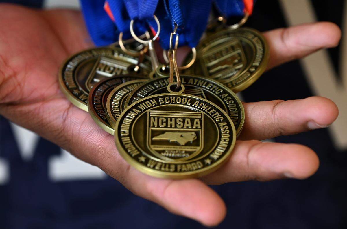Mallard Creek High wrestler Cameron Stinson Jr. is a three-time state champion who has never lost a match.