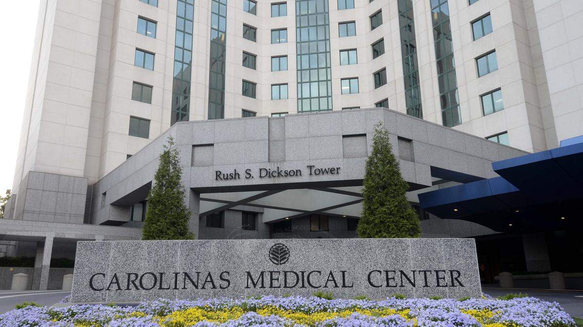 Atrium Health’s flagship hospital, Carolinas Medical Center, is shown here in Charlotte in this file photo. On Thursday, Atrium unveiled a new sign at the hospital that incorporates the Atrium name and logo.