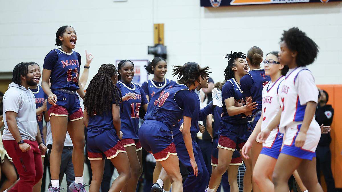 Mallard Creek Mavericks celebrate their win against the North Mecklenburg Vikings at Julius L. Chambers High School in Charlotte, N.C., on Friday, February 21, 2025.