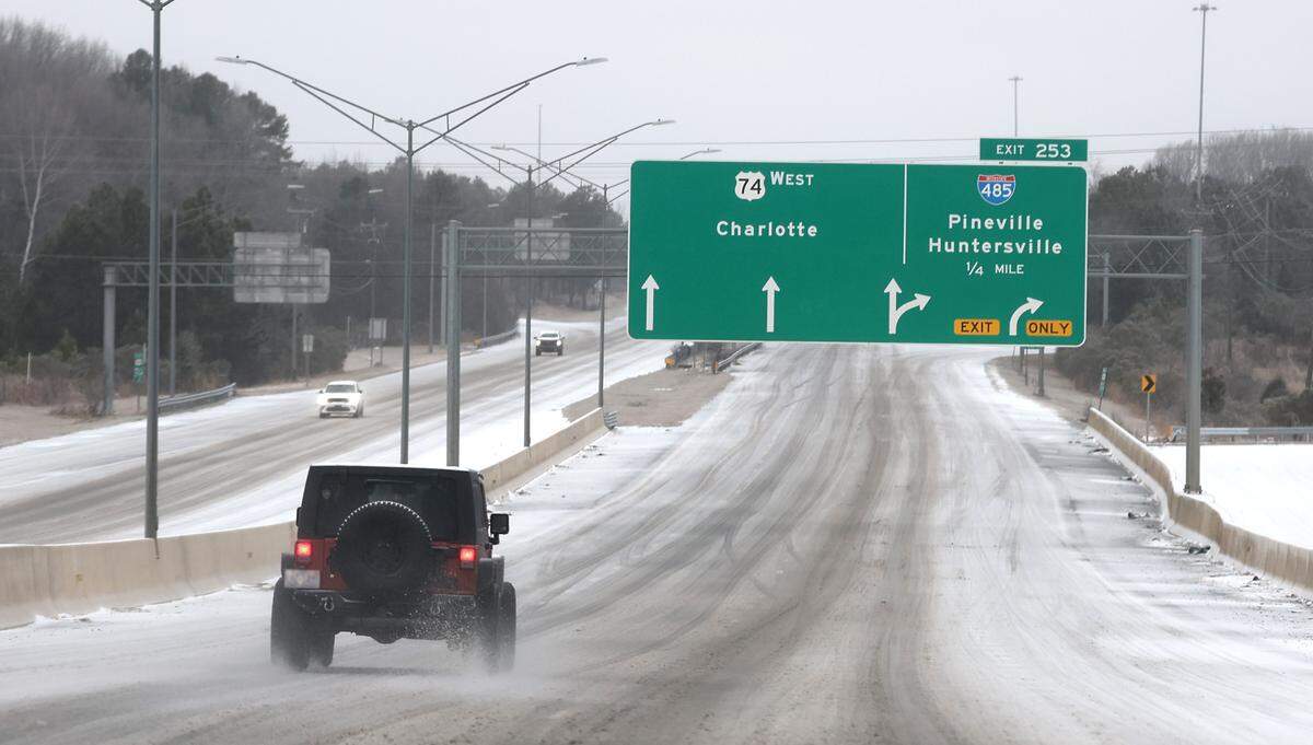 Traffic along Independence Blvd. is thinner following a wintry mix of ice, freezing rain and light show arrived in the Charlotte, NC area on Sunday, January 25, 2026. 