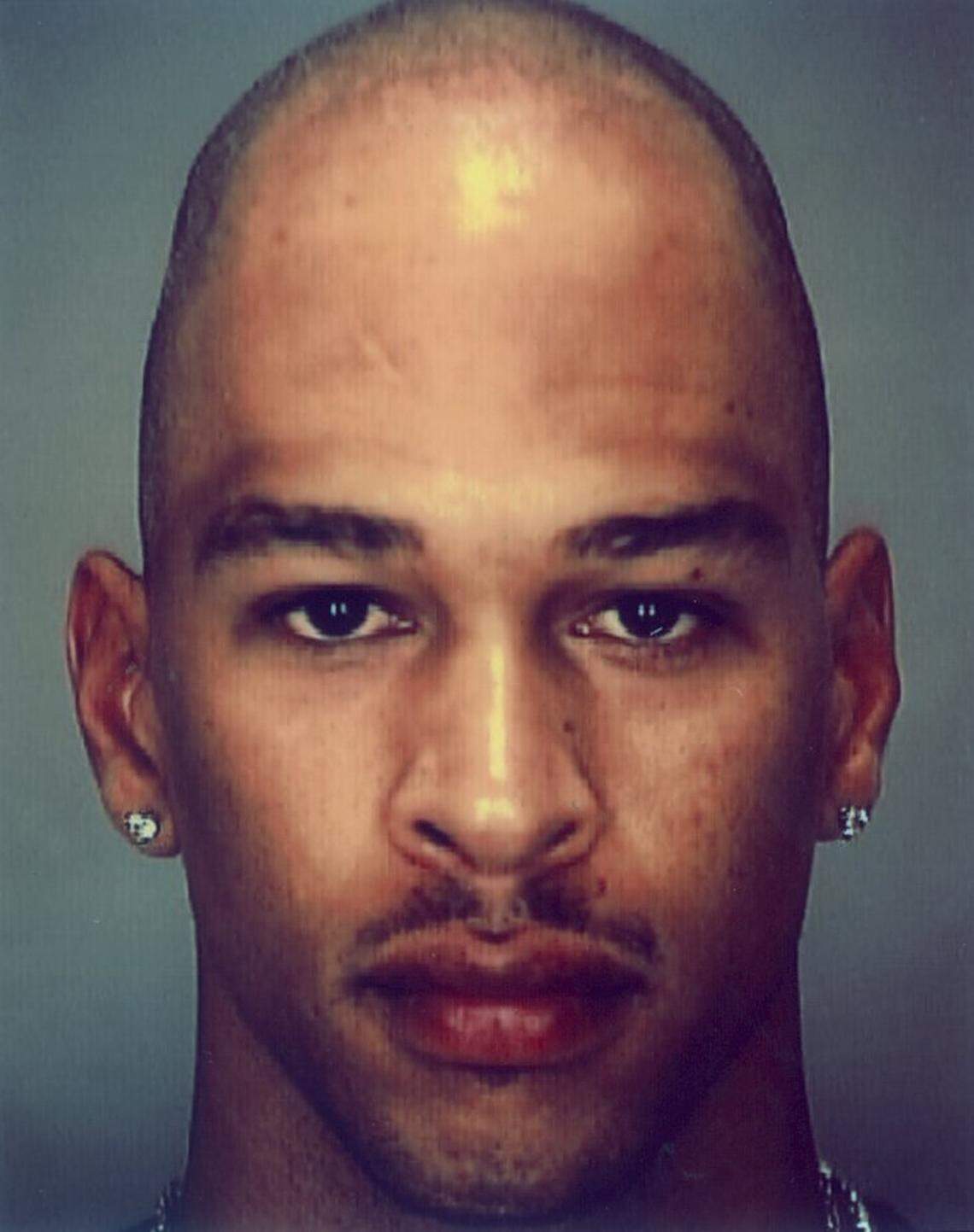 11/25/99--Rae Lamar Wiggins (aka as Rae Carruth), a wide receiver with the Carolina Panthers, was arrested in connection with a shooting of his girlfriend.