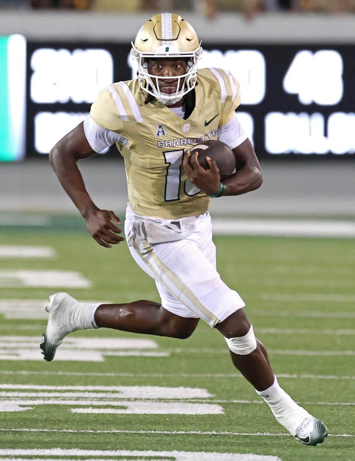 Charlotte 49ers quarterback Conner Harrell breaks to the outside on a run against the Rice Owls during action on Thursday, September 18, 2025 at Jerry Richardson Stadium in Charlotte, NC. Harrell was injured on the play.