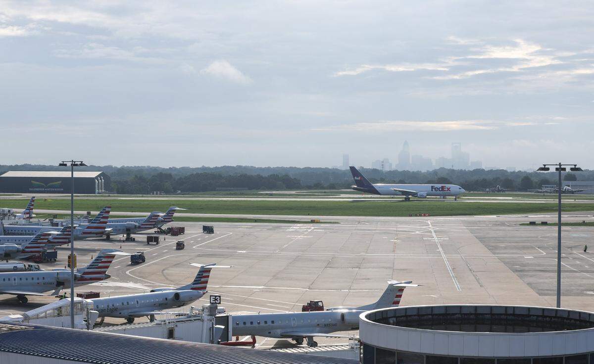A flight arrives at Charlotte Douglas International Airport on Friday.