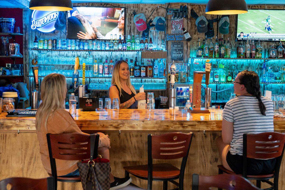 Michelle Kimball acts out customer interactions in her TikTok videos, gaining content from her job bartending at Two Buck Saloon.