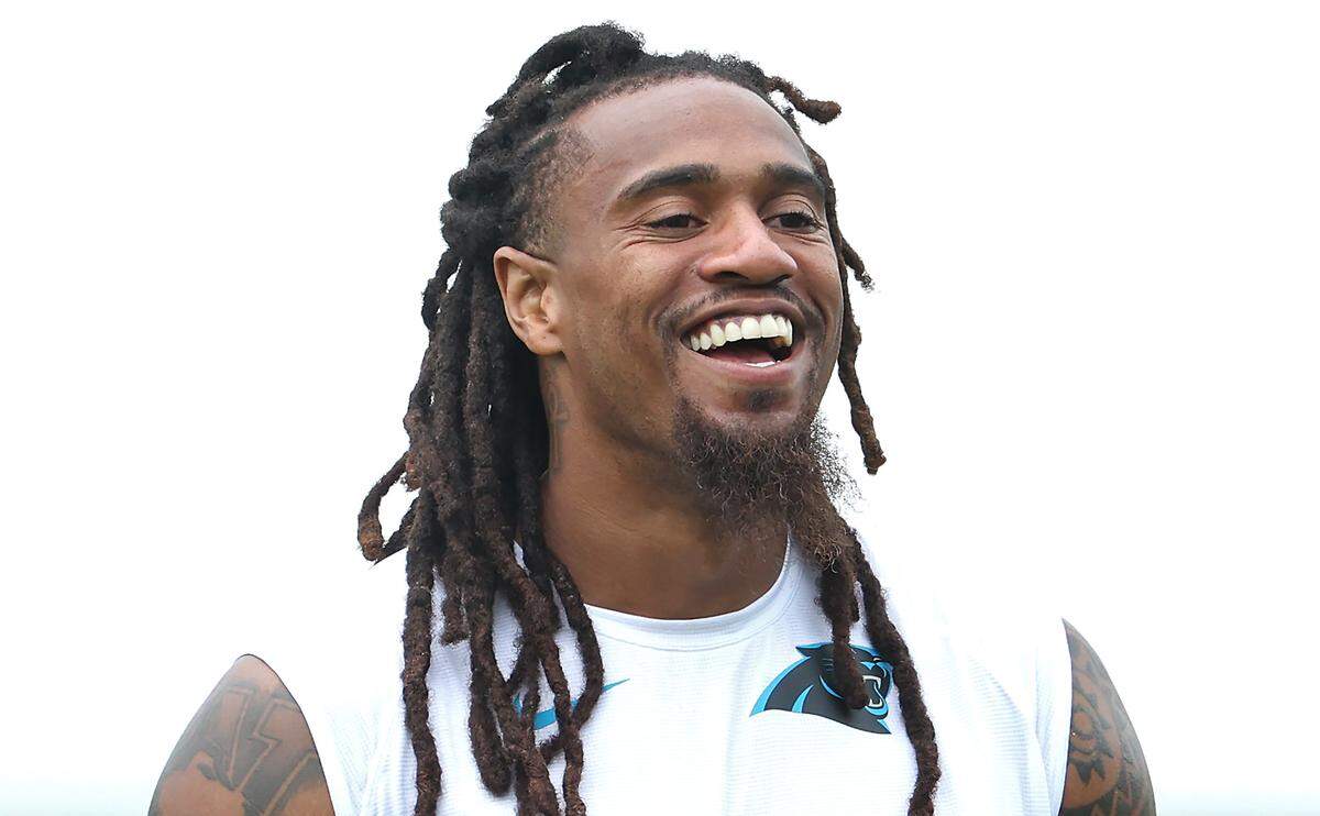 Carolina Panthers linebacker Shaq Thompson enjoys time with team personnel prior to training camp practice on Thursday, July 25, 2024.