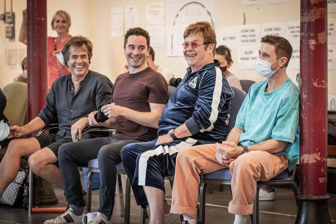 From left, at a 2022 “Tammy Faye” rehearsal, the musical’s creative team: director Rupert Goold, book writer James Graham, music composer Elton John and lyricist Jack Shears.