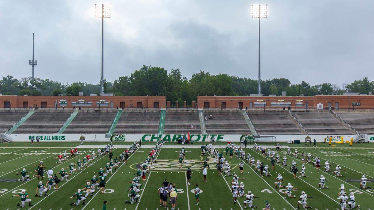 The Charlotte 49ers stretch before a scrimmage recently at Richardson Stadium. The 49ers had their third scrimmage of the preseason Saturday.