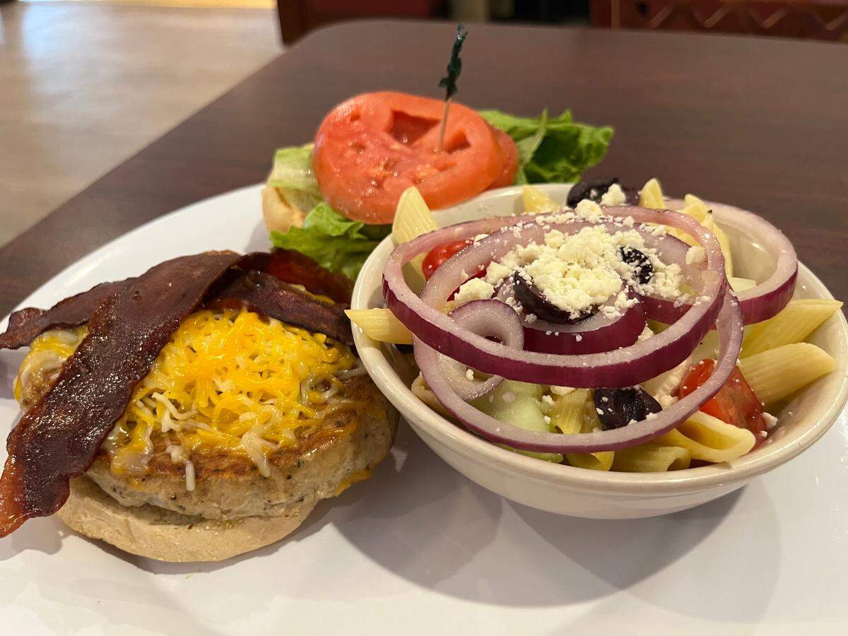 A turkey burger wtih turkey bacon and a side of pasta salad at Stacks.