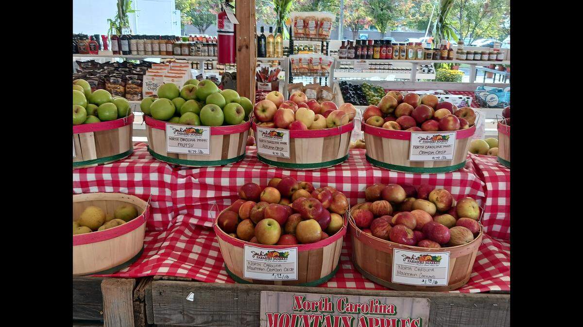 North Carolina apples await visitors at the new temporary location of Josh’s Farmers Market on River Highway in Mooresville, NC., on Sept. 29, 2023.
