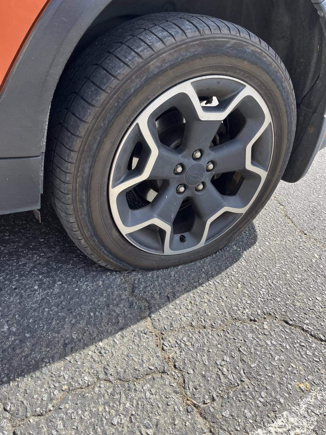 Andy Craighill’s car after the tires were slashed in February.