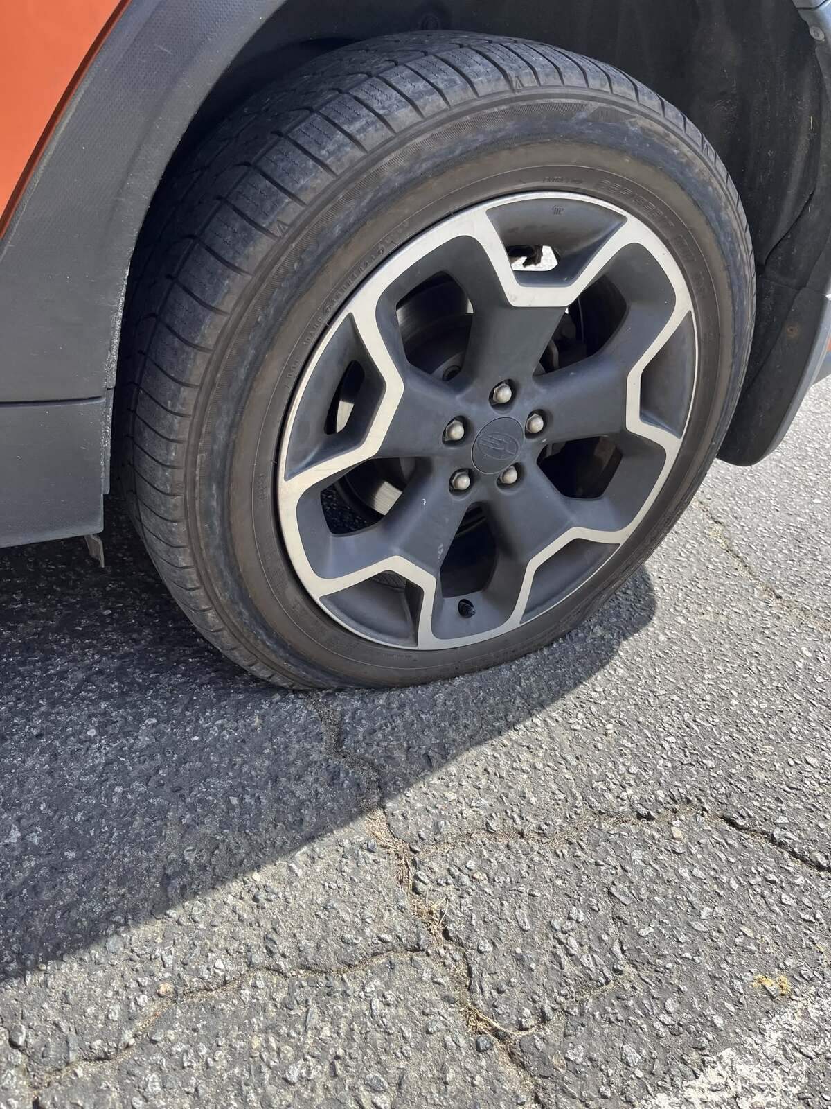 Andy Craighill’s car after the tires were slashed in February.