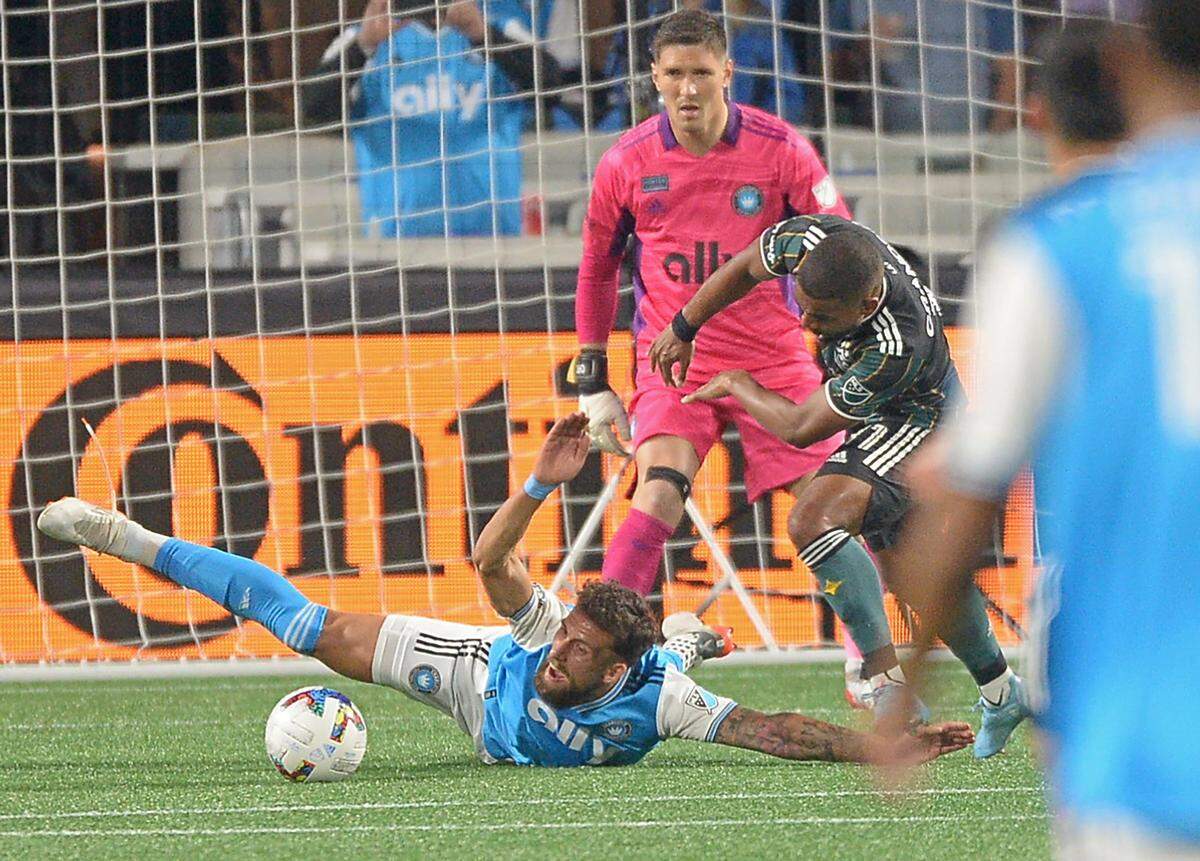 Charlotte FC Guzman Corujo is knocked to the ground as he helps defend the goal during second half action against the LA Galaxy at Bank of America Stadium in Charlotte, NC on Saturday, March 5, 2022. The LA Galaxy defeated Charlotte FC 1-0.