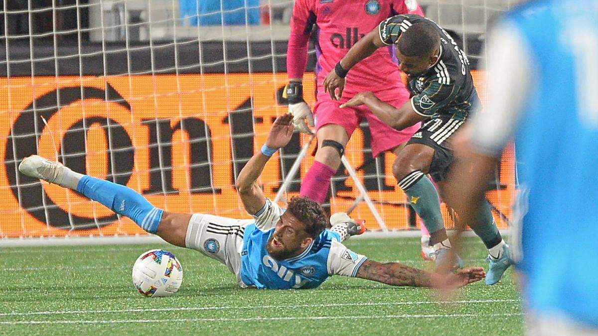 Charlotte FC Guzman Corujo is knocked to the ground as he helps defend the goal during second half action against the LA Galaxy at Bank of America Stadium in Charlotte, NC on Saturday, March 5, 2022. The LA Galaxy defeated Charlotte FC 1-0.