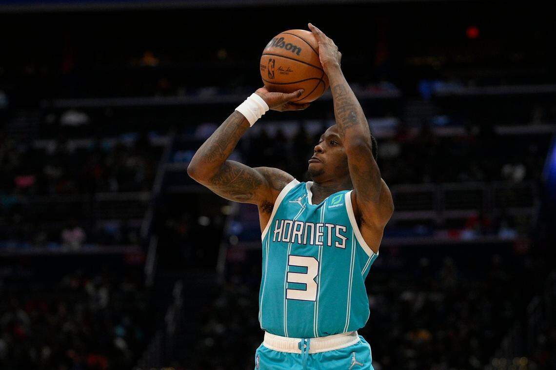 Charlotte Hornets guard Terry Rozier (3) shoots during the second half of the team’s NBA basketball game against the Washington Wizards, Monday, Nov. 22, 2021, in Washington. (AP Photo/Nick Wass)
