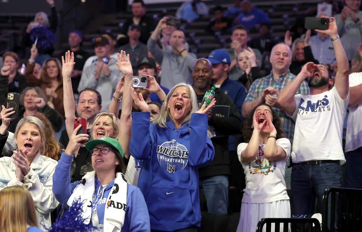 Lake Norman girls basketball fans cheer on the team following their 43-41 victory over Wakefield in the girls NCHSAA 4A State Championship game on Saturday, March 15, 2025 at Lawrence Joel Veterans Memorial Coliseum in Winston-Salem, NC.