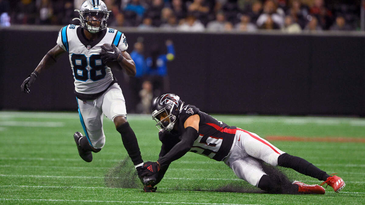 Carolina Panthers wide receiver Terrace Marshall Jr. (88) runs with the ball as Atlanta Falcons cornerback Isaiah Oliver (26) defends during the second half of an NFL football game Sunday, Oct. 30, 2022, in Atlanta. (AP Photo/John Amis)