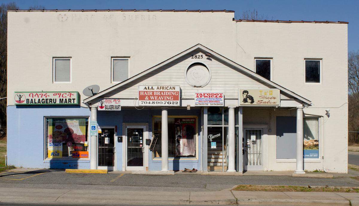 The Ethiopian convenient store Balageru Mart shares business space with All African Hair Braiding & Weaving, Tafodot African Fabrics & Many More Health & Beauty Products, and T N’ H Hair Saloon.