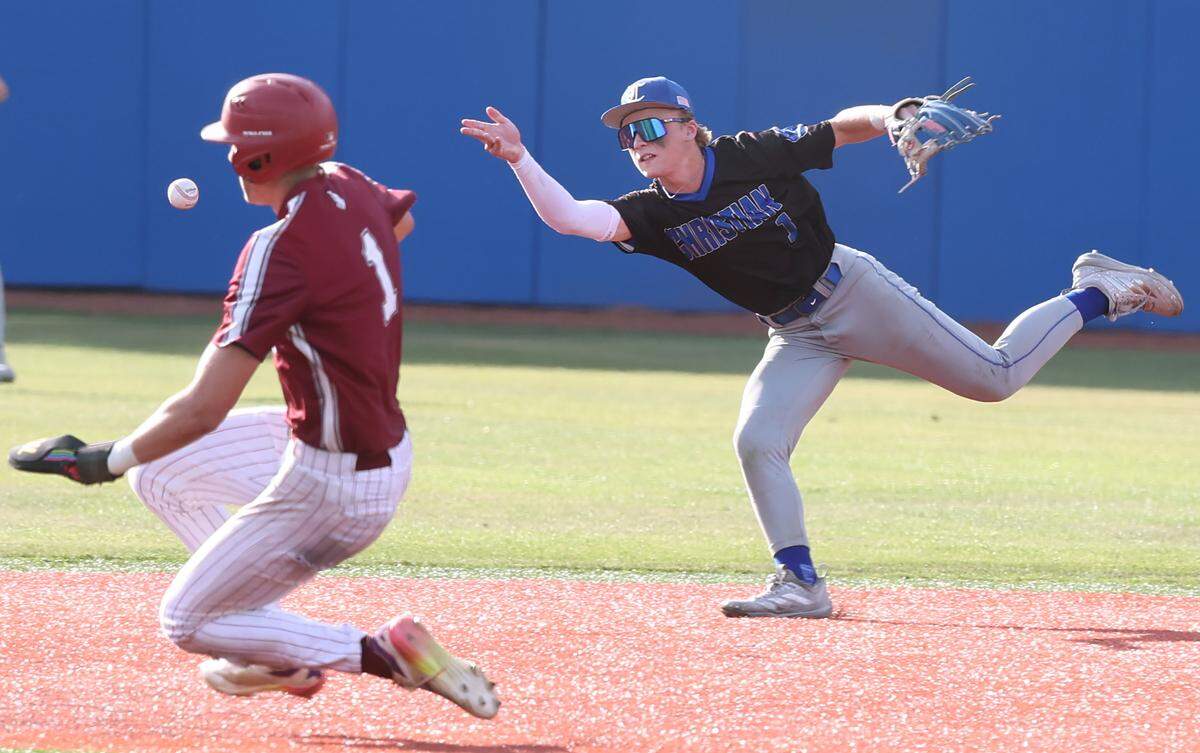 Charlotte Christian Knights second baseman Jacob Reynolds, right, tosses the ball to second as Metrolina Christian’s Jacob Seamon, left, begins his slide during in the NCISAA state championship game on Saturday, May 16, 2026. Charlotte Christian defeated Metrolina 8-5.