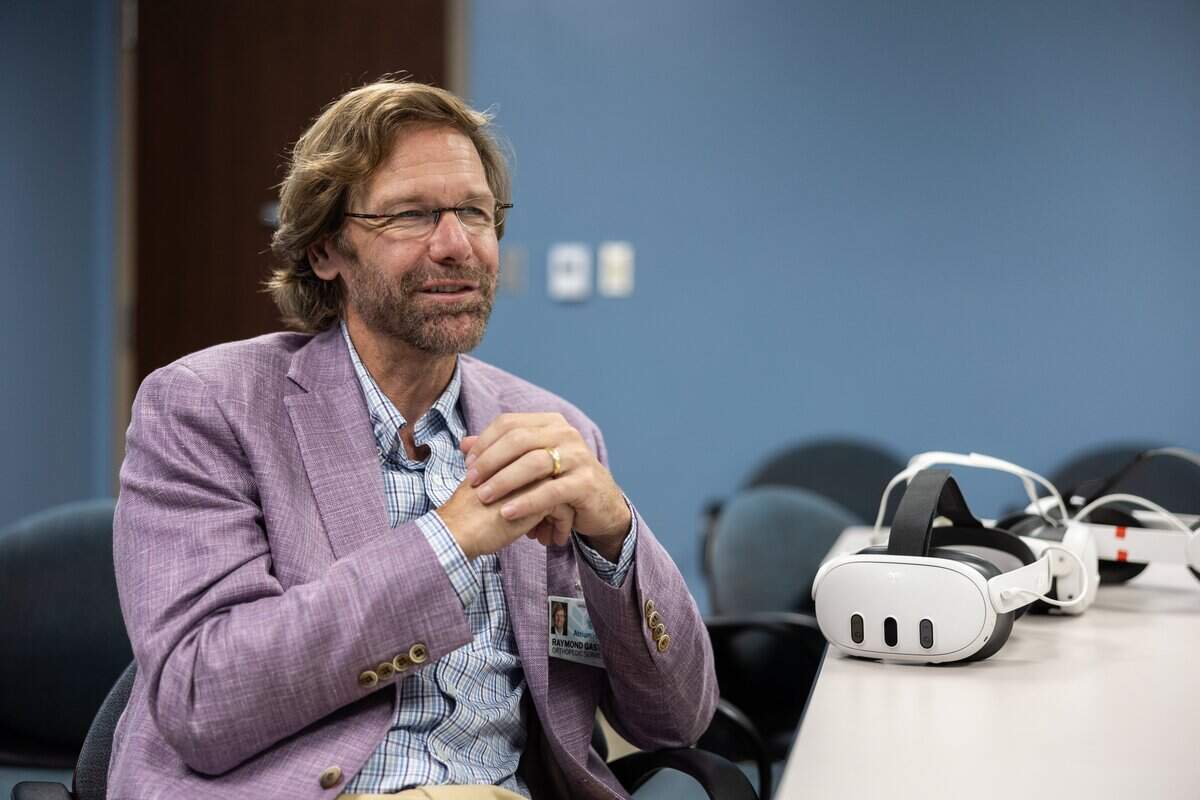 Glenn Gaston, an orthopedic surgeon and director of the OrthoCarolina Hand Center, has helped pioneer the use of virtual reality to reduce phantom limb pain in amputees by retraining their brains.