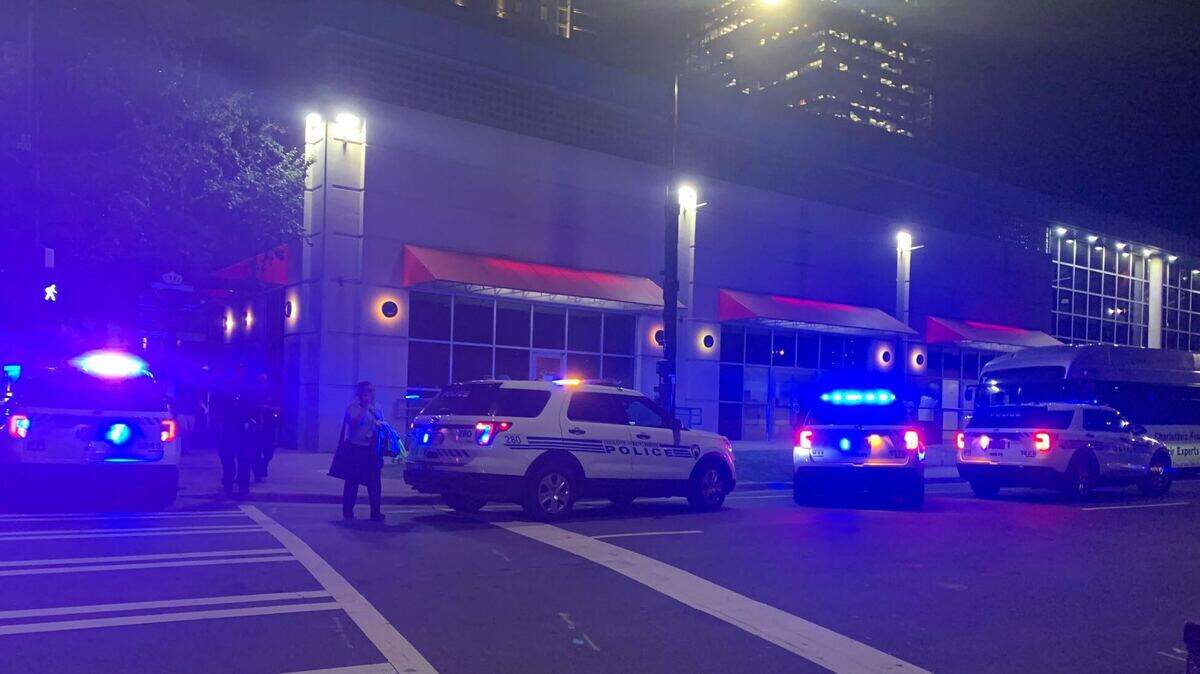 Charlotte-Mecklenburg police vehicles surround the transportation center on Trade Street in uptown on Tuesday, September 20, 2022.