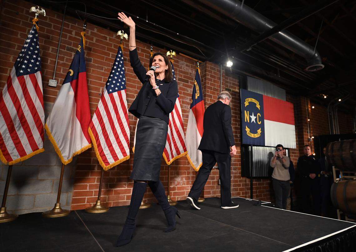 Nikki Haley waves to supporters as she walks onto the stage at Norfolk Hall at Suffolk Punch in SouthEnd on Friday, March 1, 2024 in Charlotte, NC.