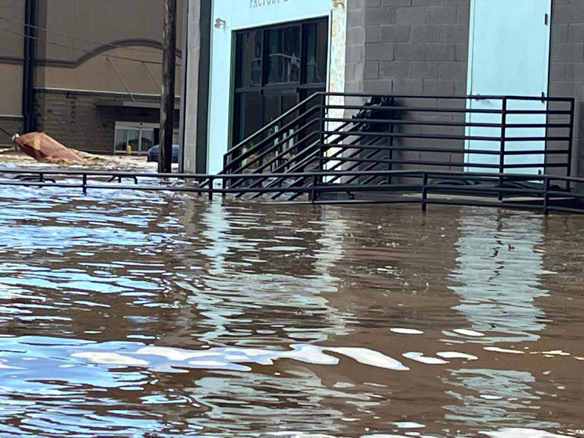 At French Broad Chocolate Factory & Cafe, Hurricane Helene caused flooding outside of the shop, and it was left without water and power.
