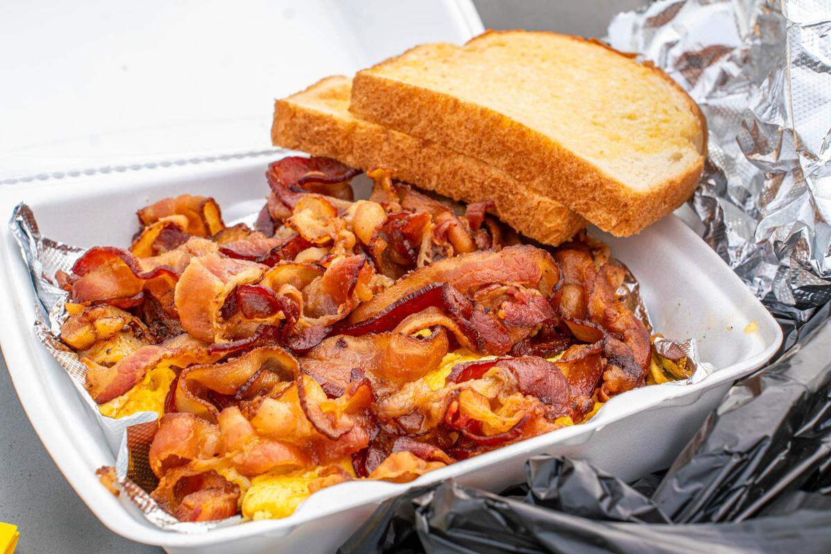 The breakfast platter with bacon at Bob’s Carry Out Pile ‘Em Up.