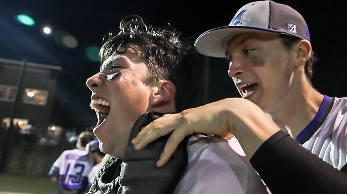 Mooreville catcher Davis Turner gets the final out Friday in the Blue Devils 5-4 upset of Providence High in an NCHSAA 4A regional semifinal.