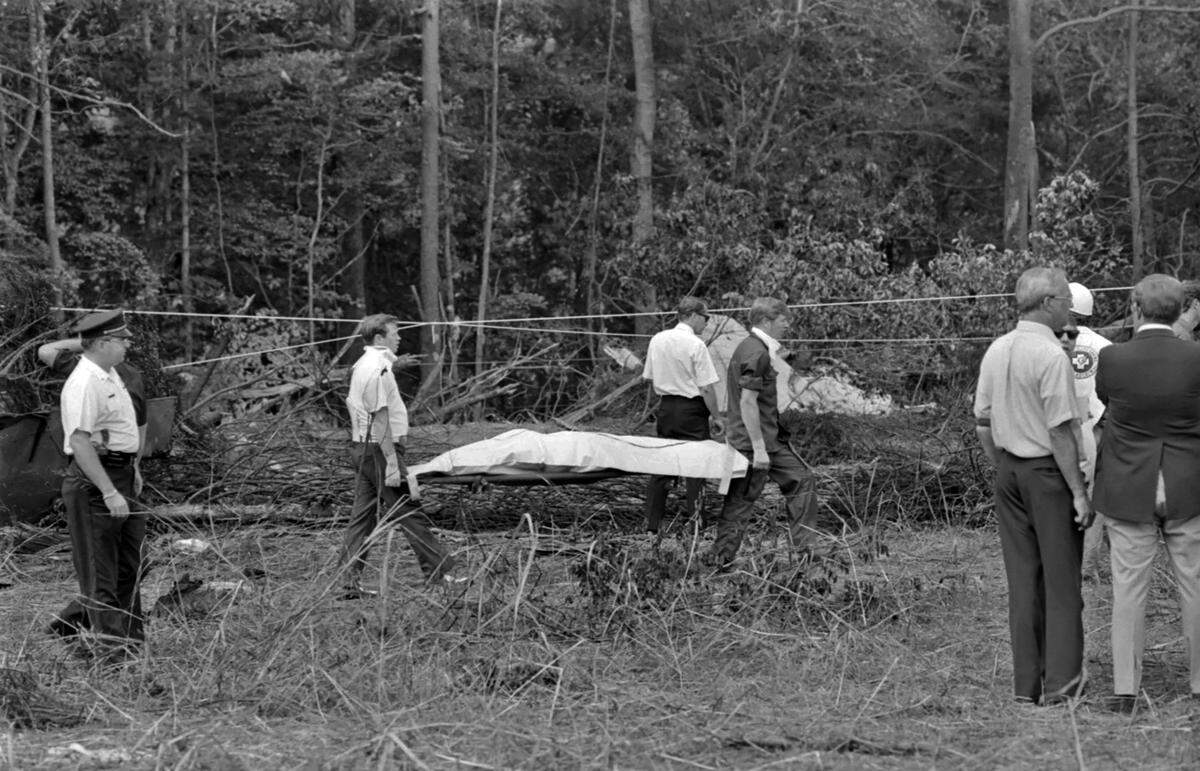 First responders on the scene of the crash of Eastern Flight 212 in Charlotte on Sept. 11, 1974.