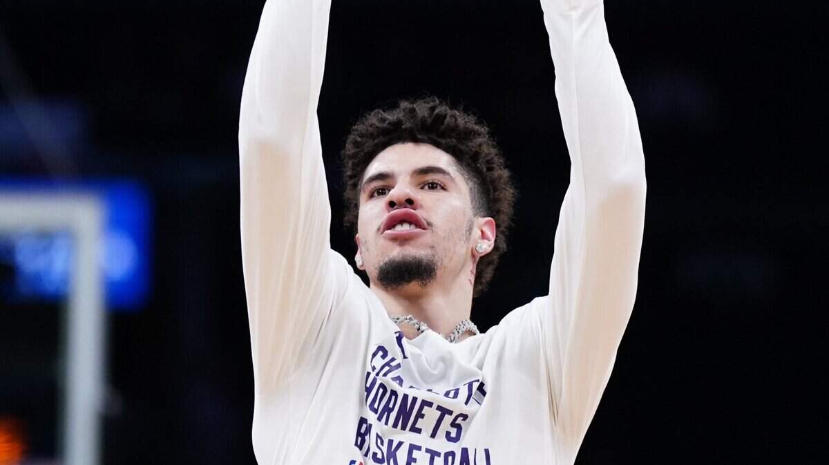 Charlotte Hornets guard LaMelo Ball warms up before the start of the game against the Boston Celtics at TD Garden.