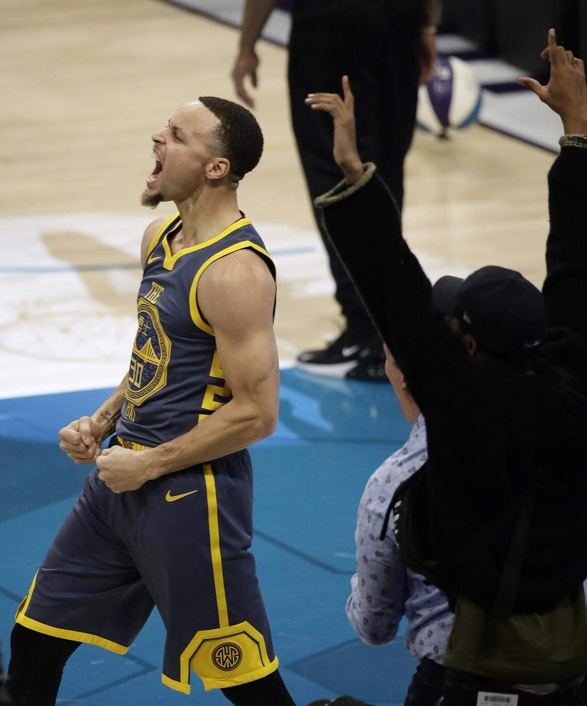 Golden State’s Stephen Curry celebrated a streak of six straight made three-pointers during the first round of the NBA’s three-point contest Saturday night. Curry ultimately finished second to Brooklyn’s Joe Harris.