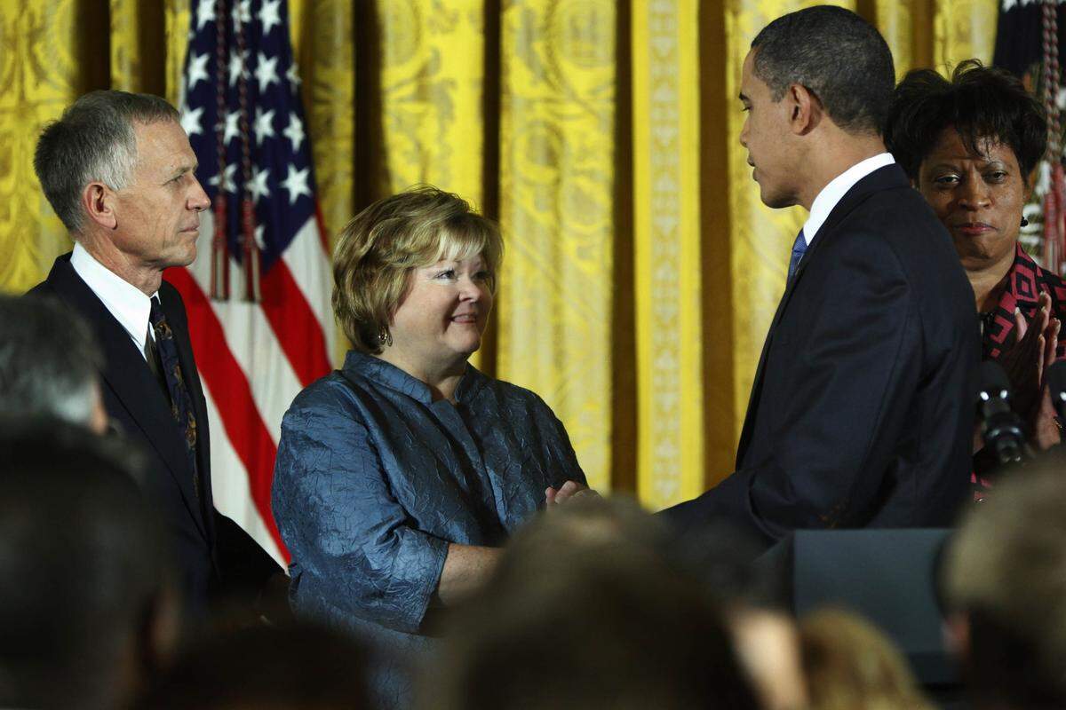 President Barack Obama greets Dennis and Judy Shepard during a White House reception commemorating the enactment of the Matthew Shepard and James Byrd Jr. Hate Crimes Prevention Act in this 2009 file photo. Their son is the focus of Charlotte Master Chorale’s latest performance, “Considering Matthew Shepard.”