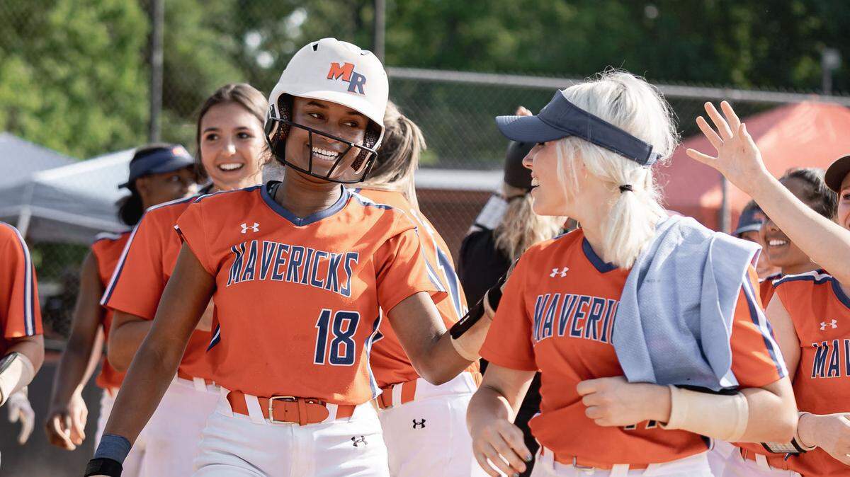Marvin Ridge celebrates Anna Mcgowan (12) two run homerun. South Meck would host Marvin Ridge in the 4th round Women’s Softball high school playoffs Friday May 20, 2022.