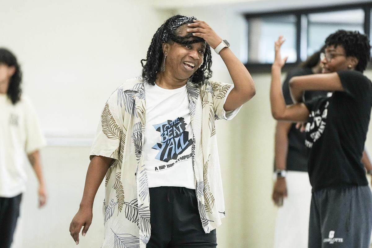 Assistant professor of dance Ashley Tate looks on while teaches a dance routine ahead of the hip hop symposium she is producing at UNC Charlotte, Wednesday, Sept. 24, 2025, in Charlotte, N.C.