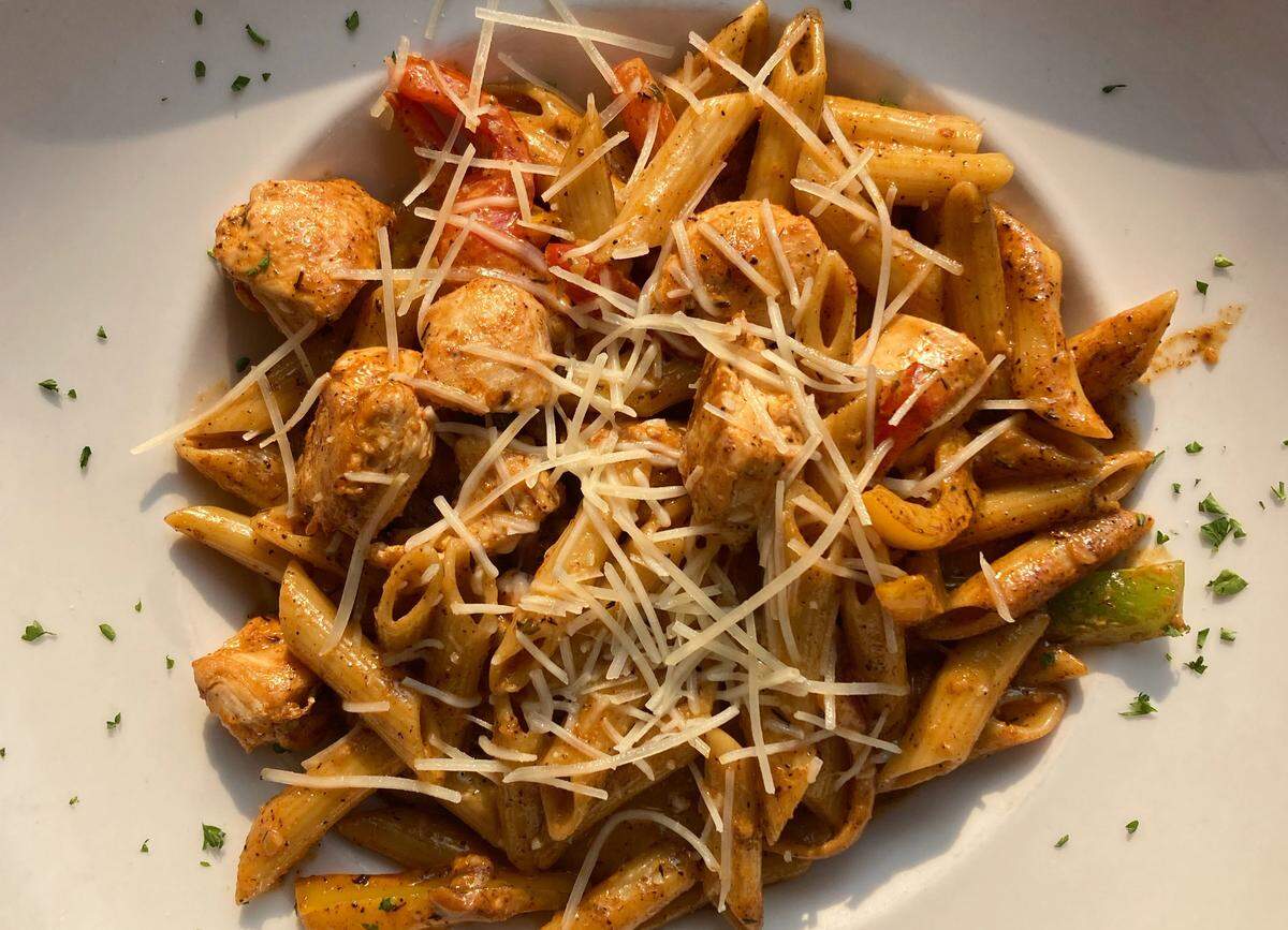Harp & Crown’s Chicken Creole Alfredo with Cajun chicken, peppers and onions in a light cream sauce ($16.50).