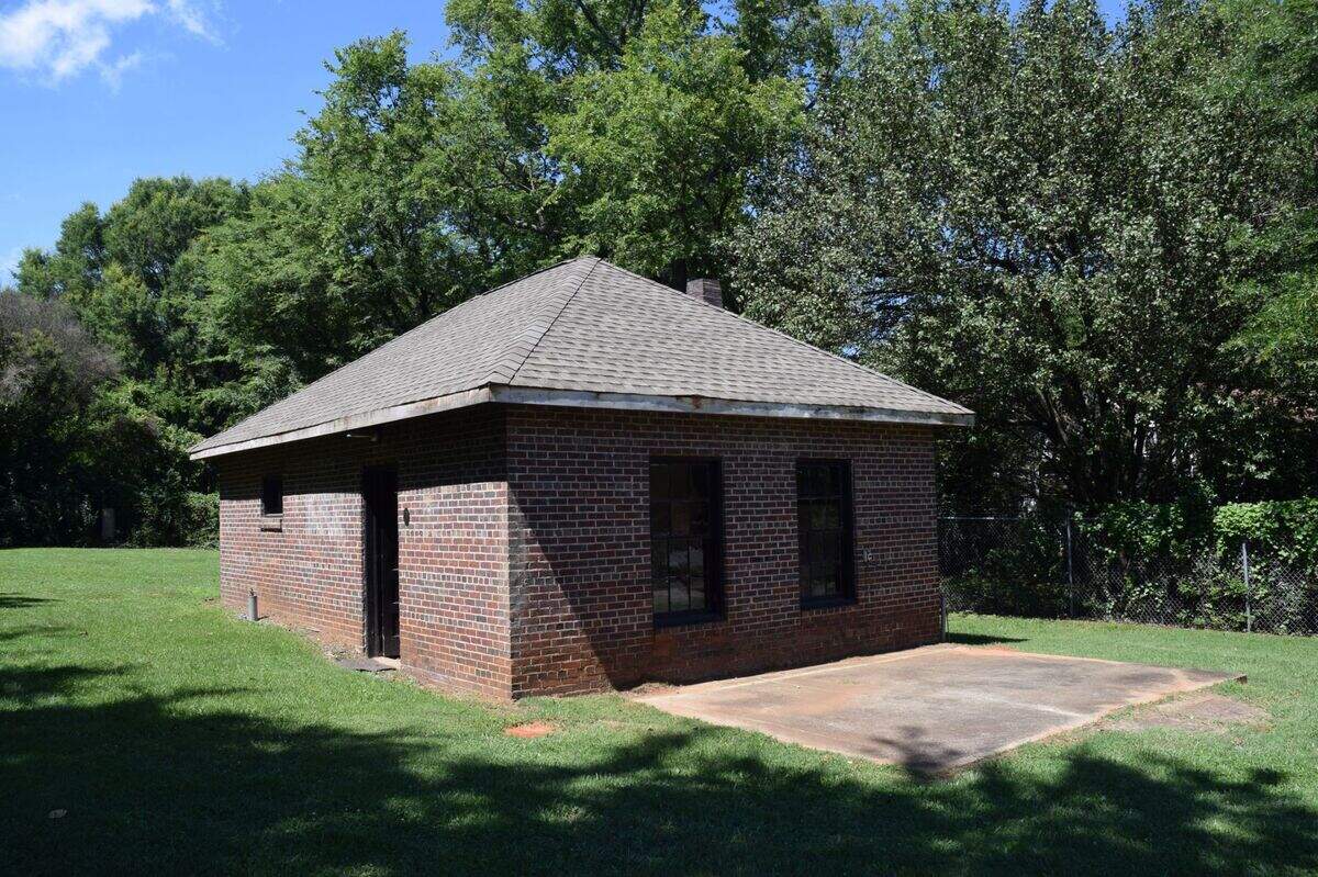 The Huntersville Town Jail, built circa 1935, is the oldest surviving municipal building in the town.