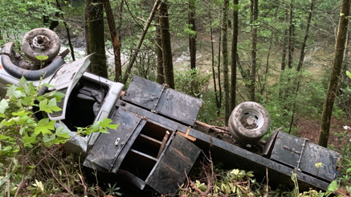 The crumbled pickup had to be stabilized by rescue workers before they pulled the driver from inside, officials said. The driver escaped with minor injuries.