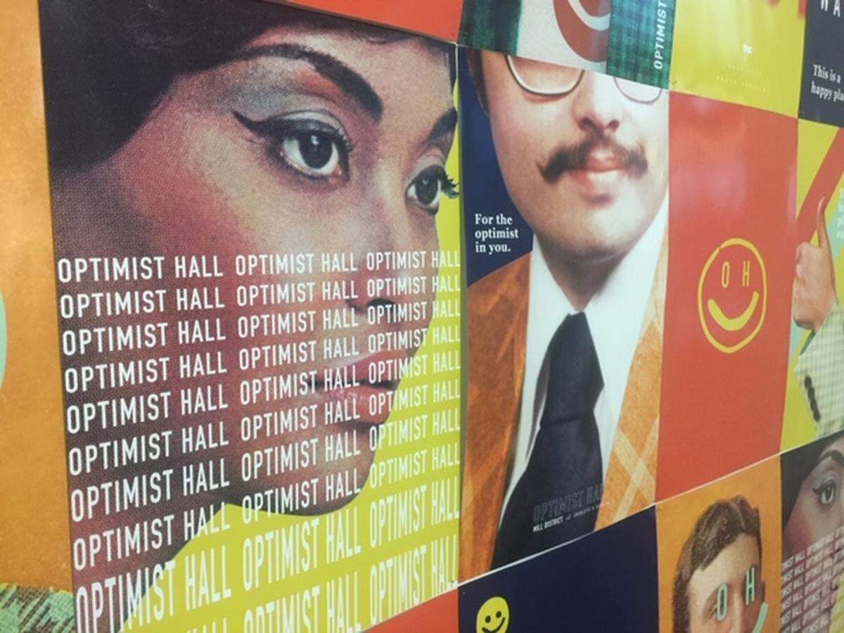 Forget Tompkins Hall, the original name of the large reclaimed mill project. It’s now Optimist Hall, with the emphasis on “OH.”